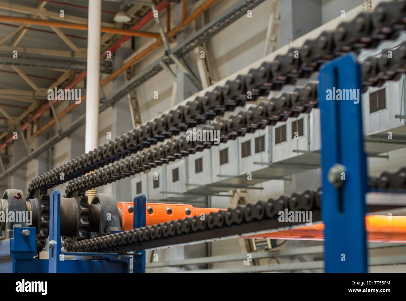 The mechanism of the chain transmission. Bearing, drive shaft, gear and