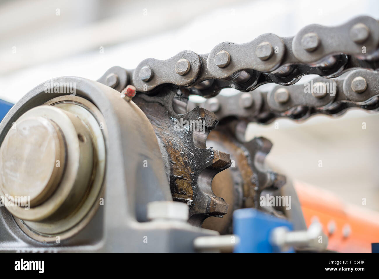 The mechanism of the chain transmission. Bearing, drive shaft, gear and