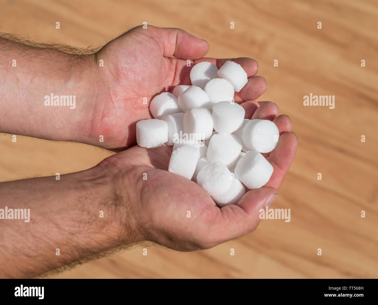 Salt pellets for the water softener. Stock Photo