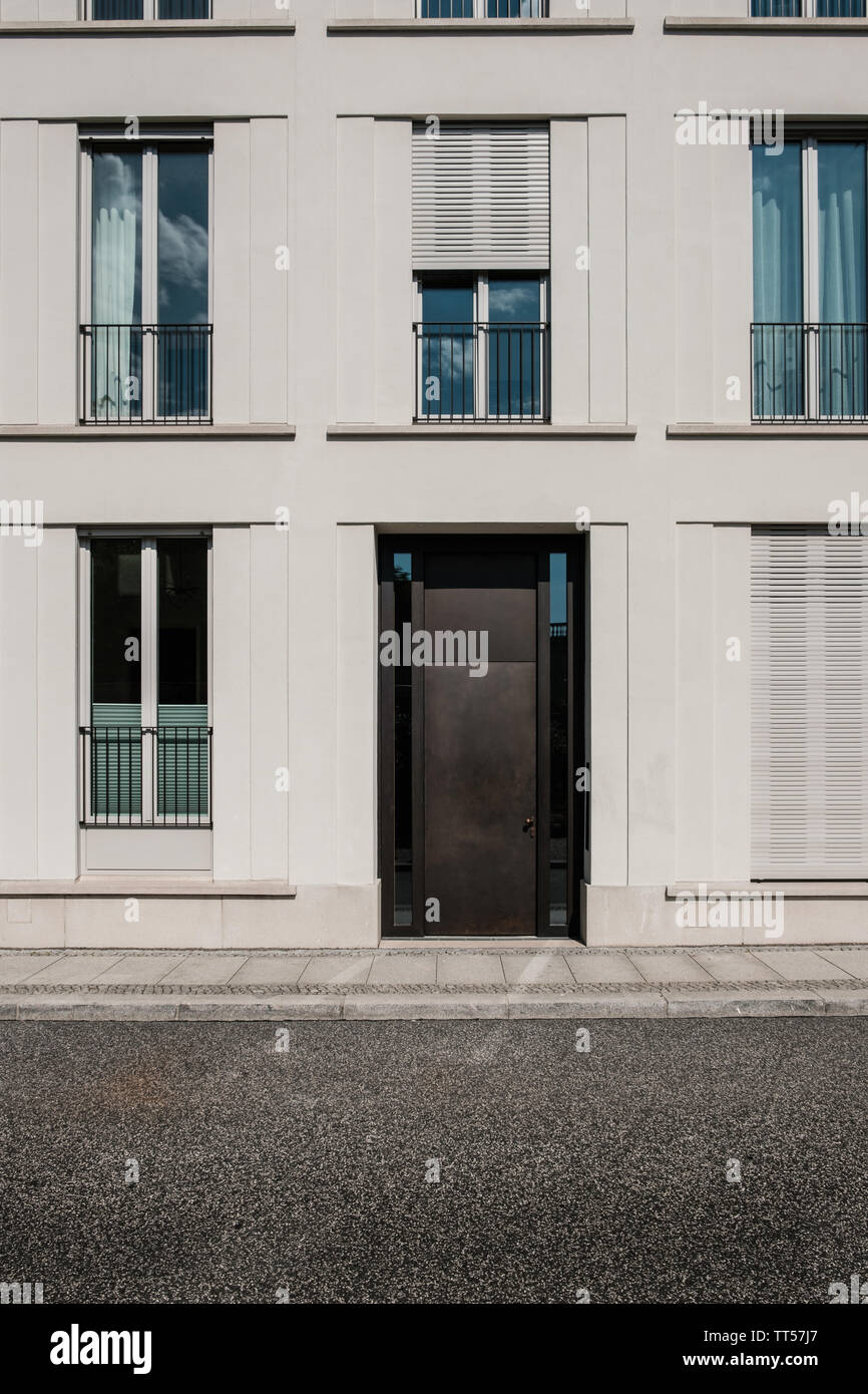 entrance door on modern building  with empty street Stock Photo