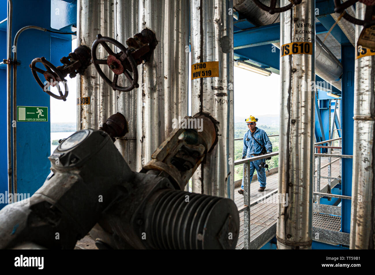 Man working at Bahia las Minas Thermal Power Plant. Colon, Panama. Stock Photo