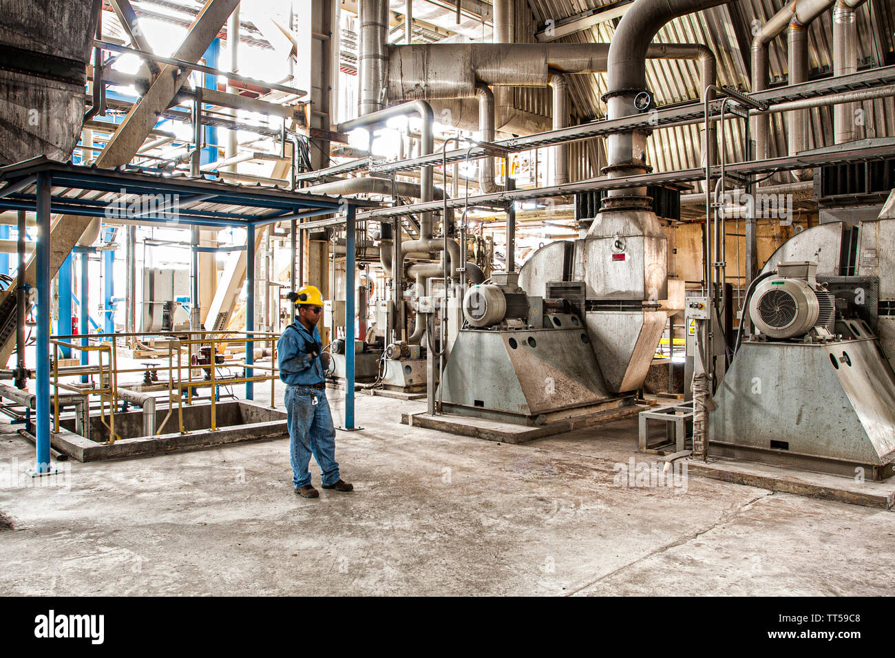 Man working at Bahia las Minas Thermal Power Plant. Colon, Panama. Stock Photo