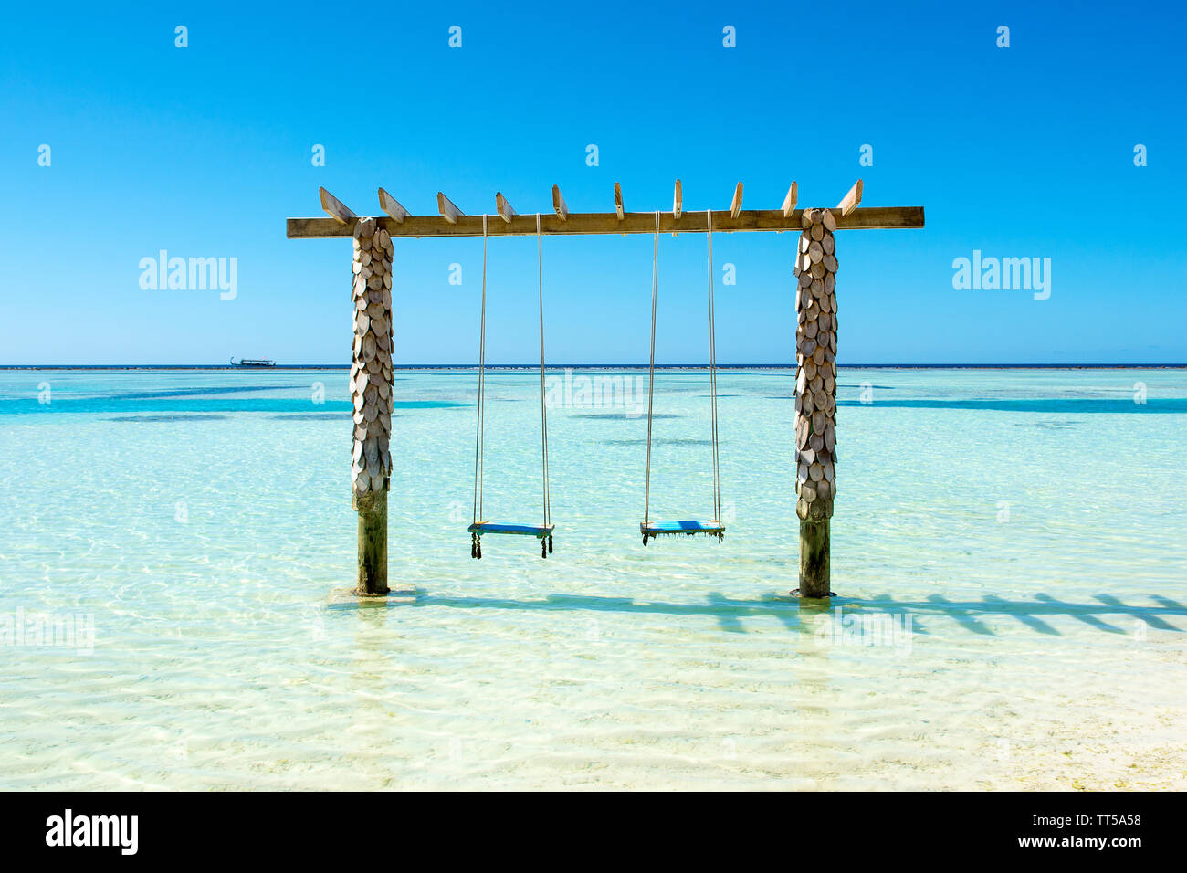 Beautiful landscape with swings in Indian Ocean, Maldives Stock Photo Alamy