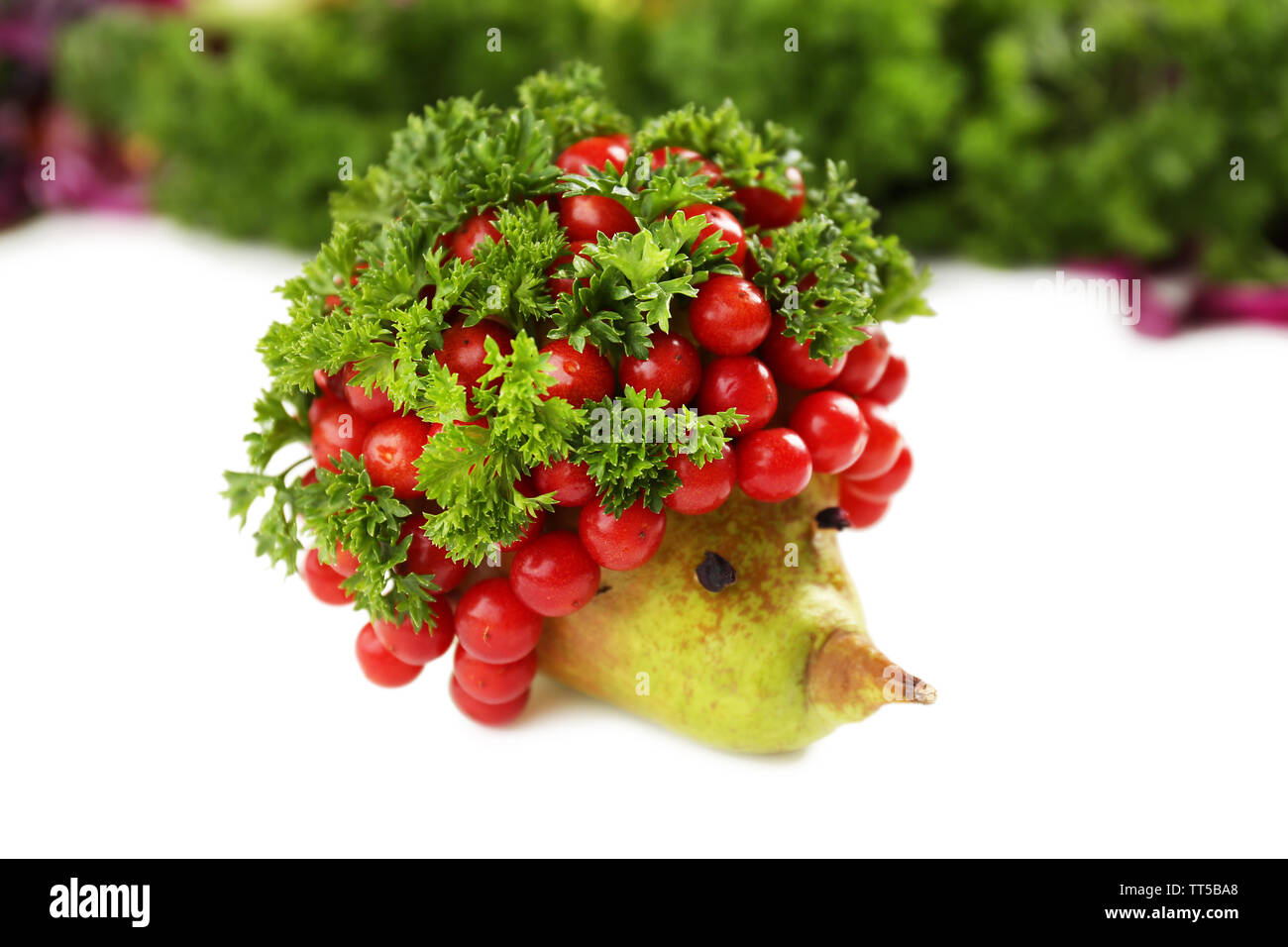 Healthy eating. Hedgehog made of vegetables and fruits, close up Stock