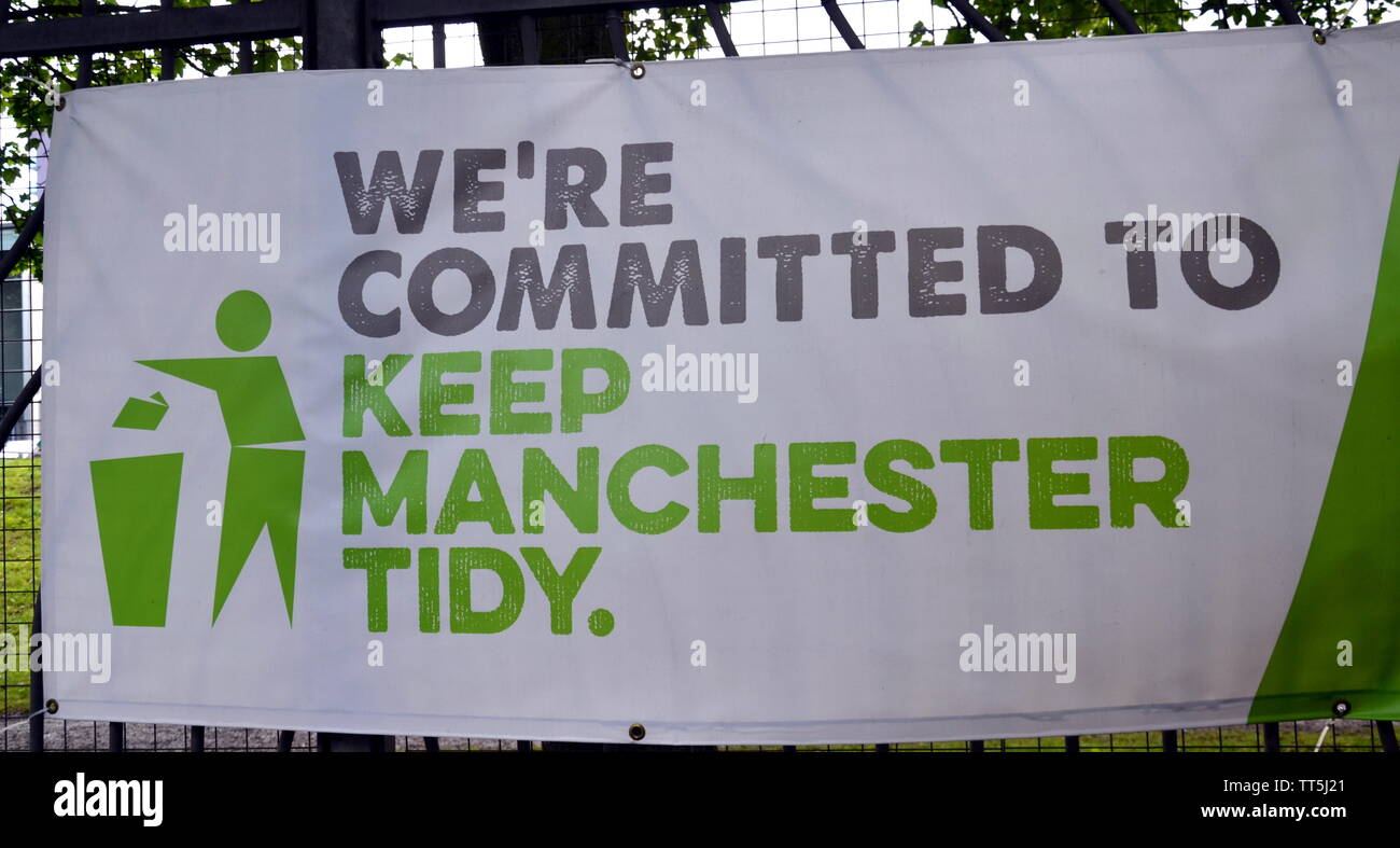 A 'Keep Manchester Tidy' Banner on the fence of a school in Manchester, uk Stock Photo