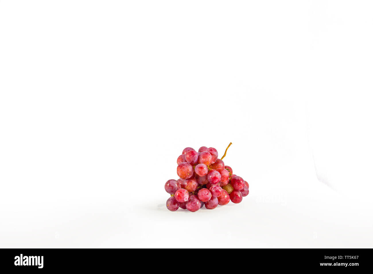 cardinal grapes white background isolated Stock Photo - Alamy