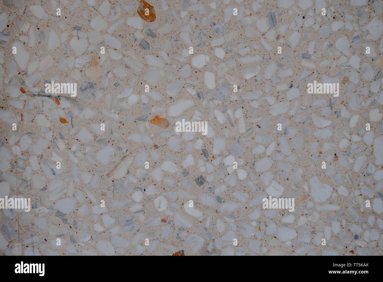 White small stones and cement wall / floor Stock Photo