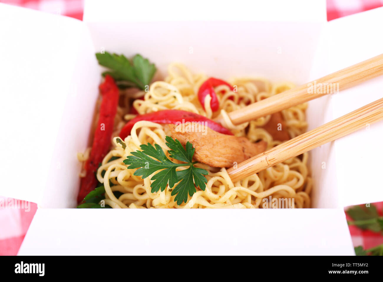 Chinese noodles in takeaway box closeup Stock Photo Alamy
