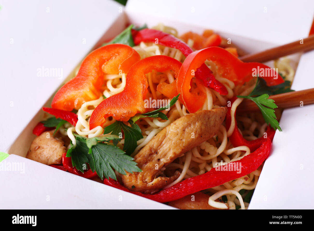 Chinese noodles in takeaway box closeup Stock Photo Alamy