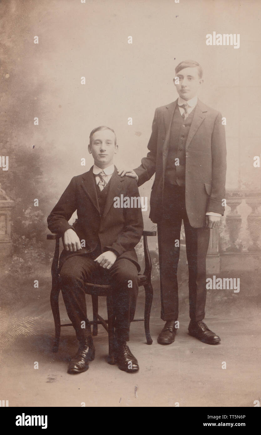 Vintage Walthamstow, London Photographic Postcard of Two Boys Wearing Suits For a Photographic Studio Portrait. Stock Photo