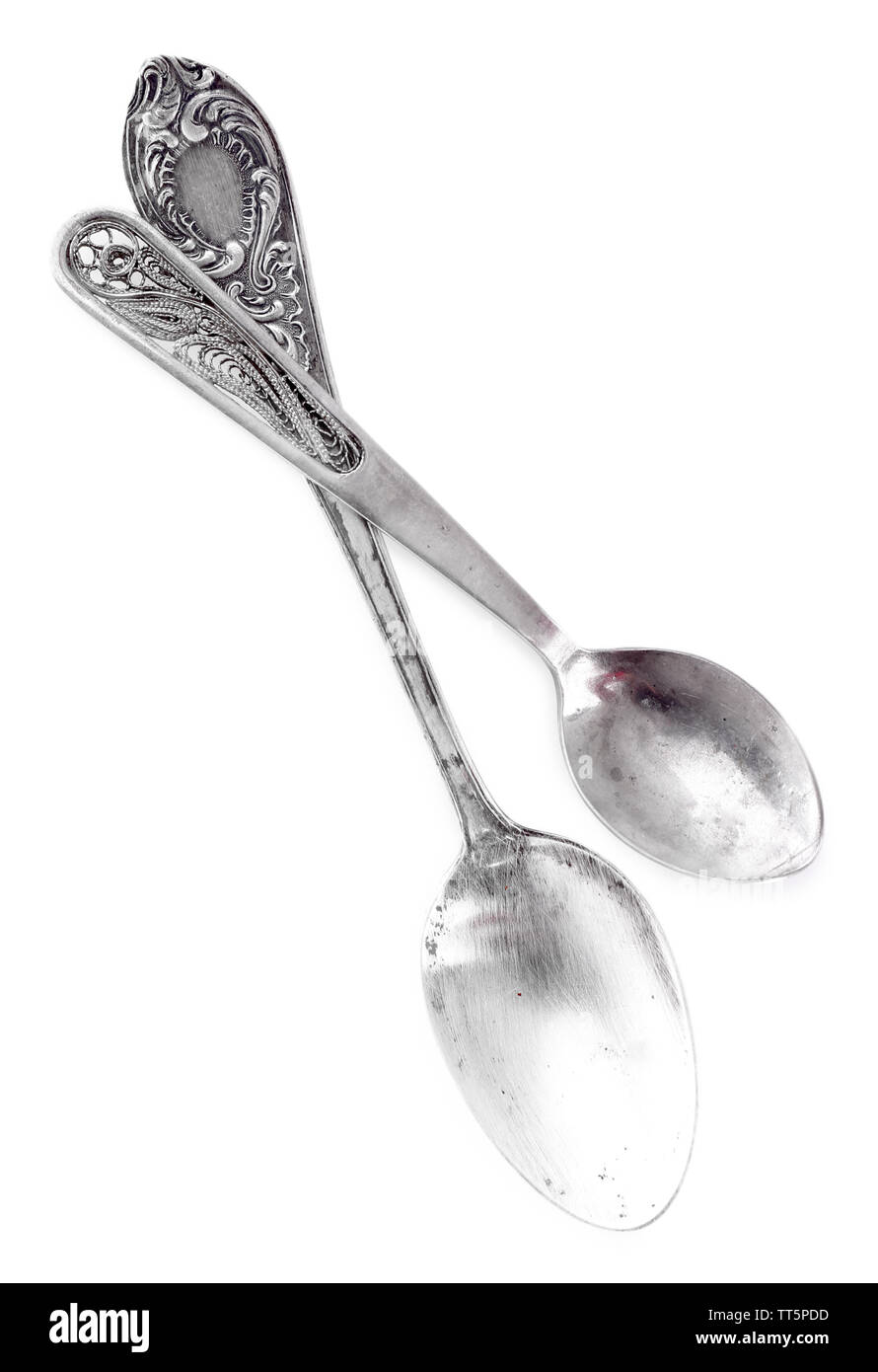 Two Join Spoons Pair of spoons isolated on white Stock Photo - Alamy
