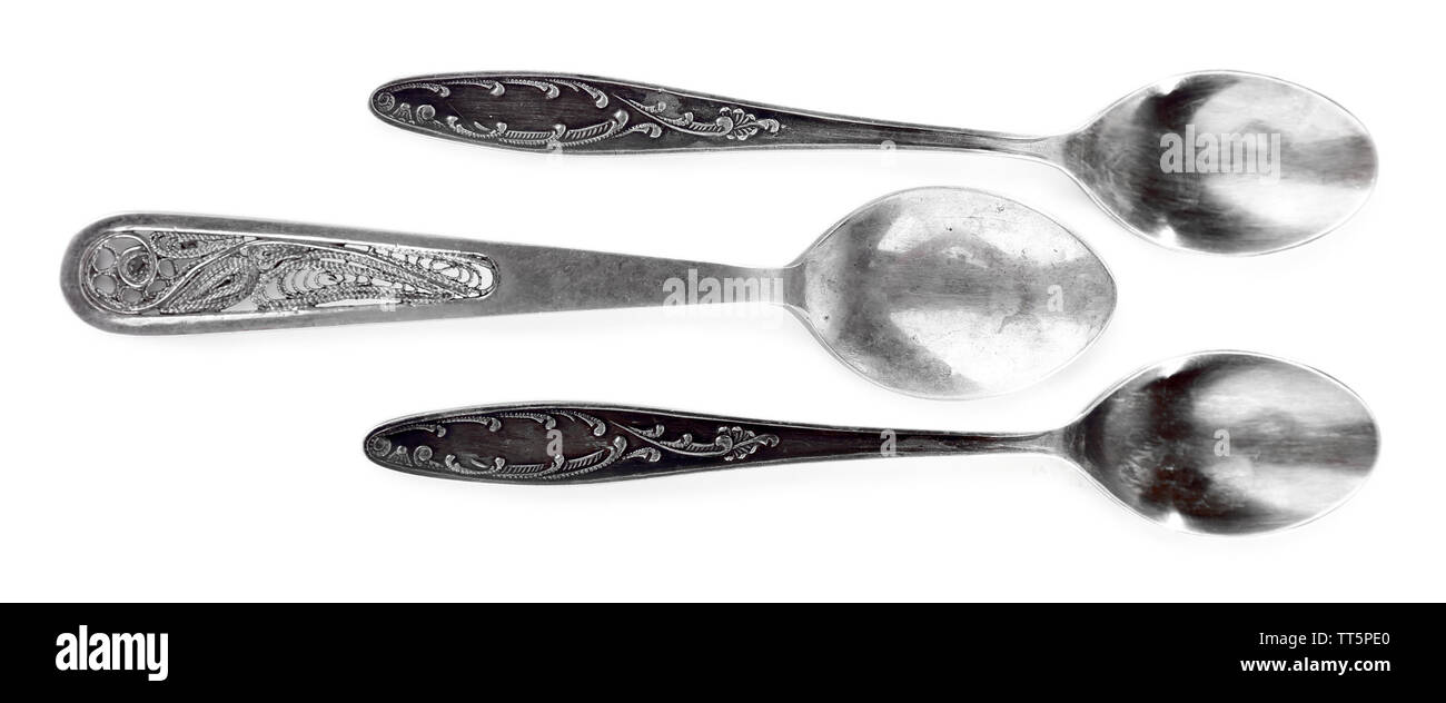 Three teaspoons isolated on white Stock Photo - Alamy