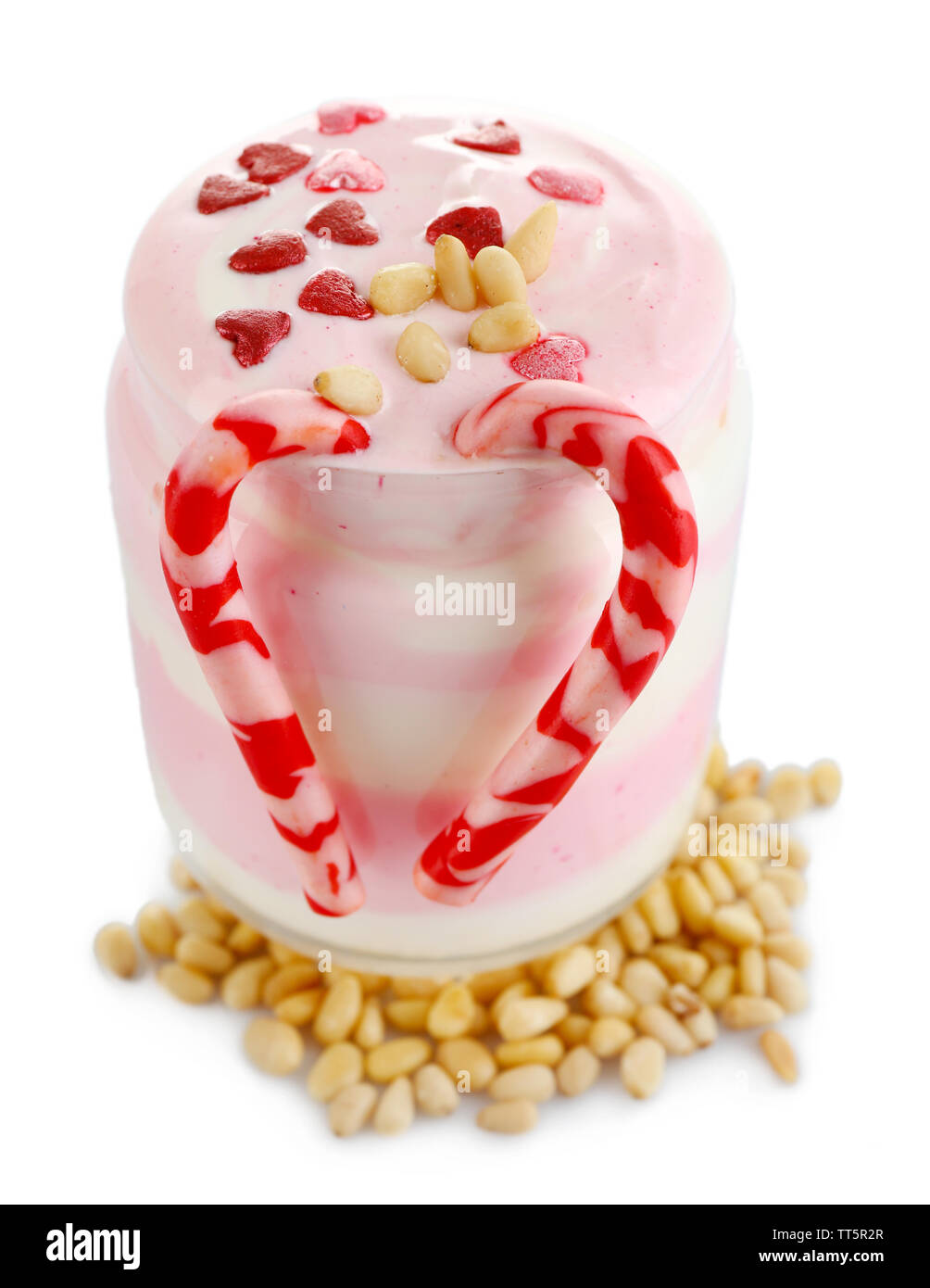 Raspberry milk dessert in glass jar, isolated on white Stock Photo Alamy