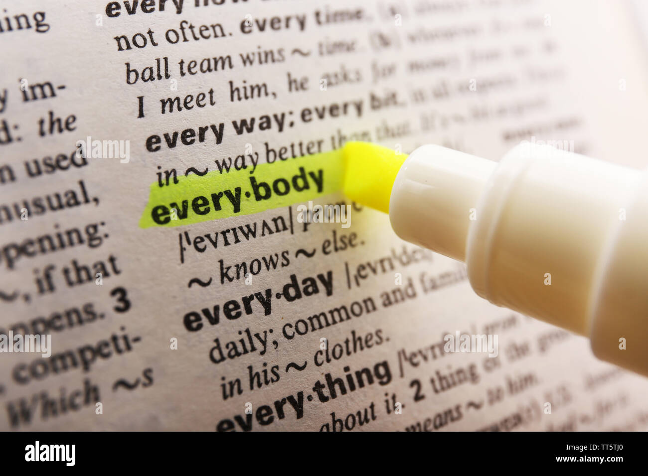 Yellow marker highlighting word in dictionary Stock Photo Alamy
