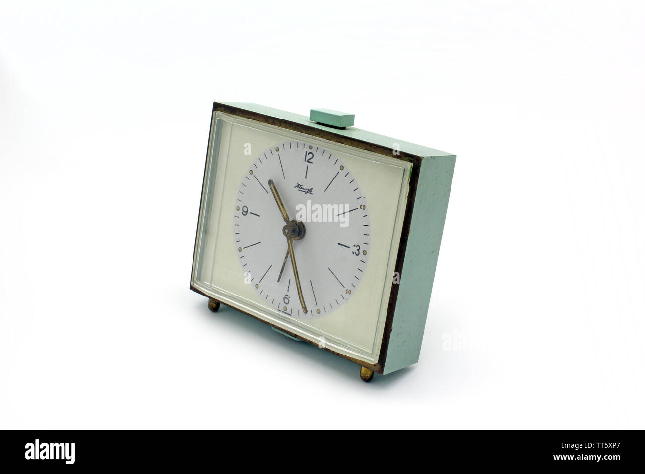 Vintage Kienzle, german metal green alarm clock, isolated on white