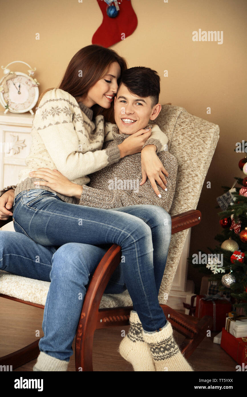 Young couple hugging chair hi res stock photography and images Alamy