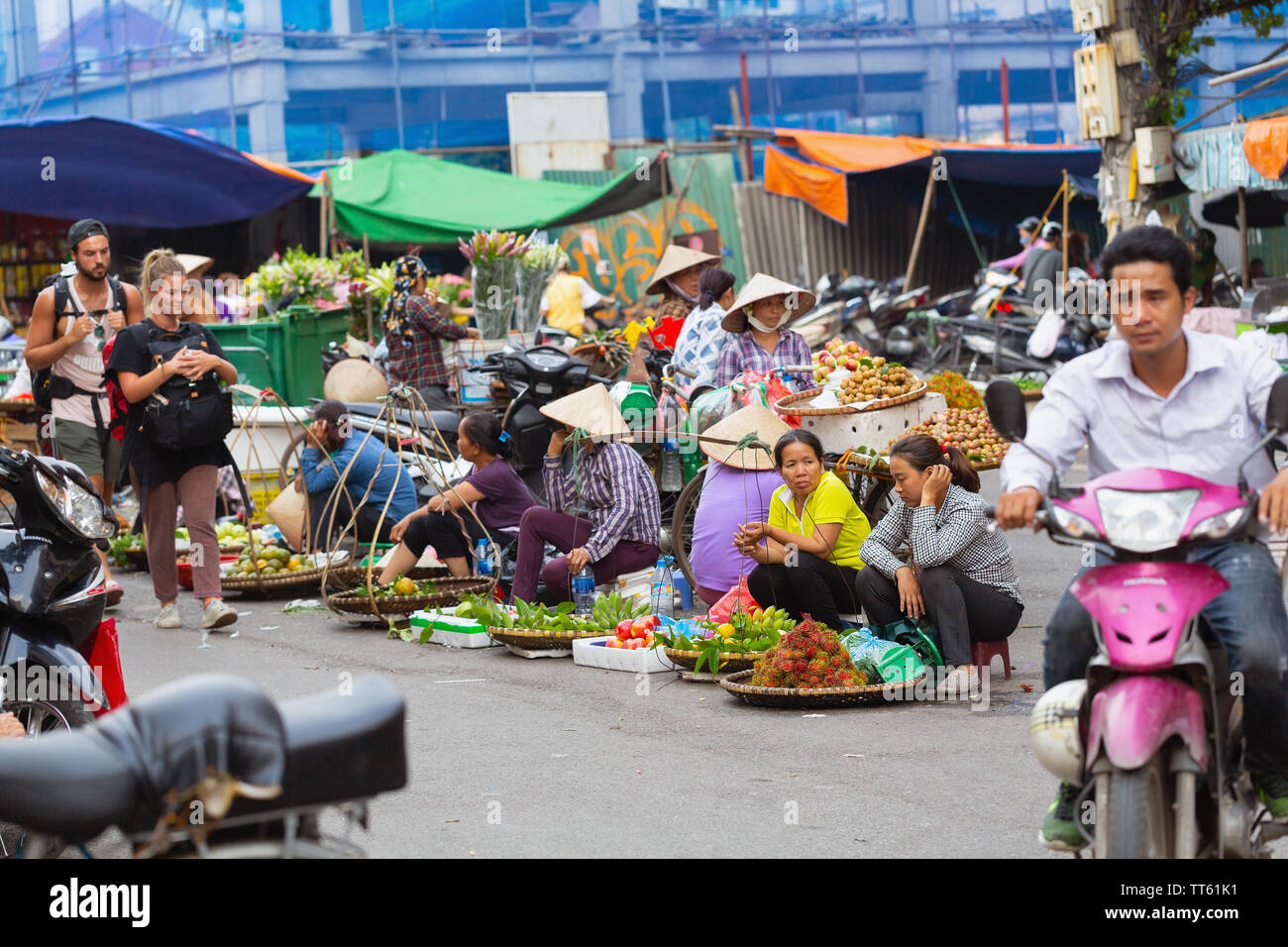 Group of produce Vendors, Old Quarter, Hanoi, Vietnam, Asia Stock Photo