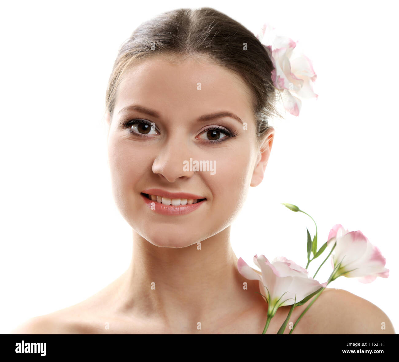 Beautiful young woman with flowers isolated on white Stock Photo - Alamy