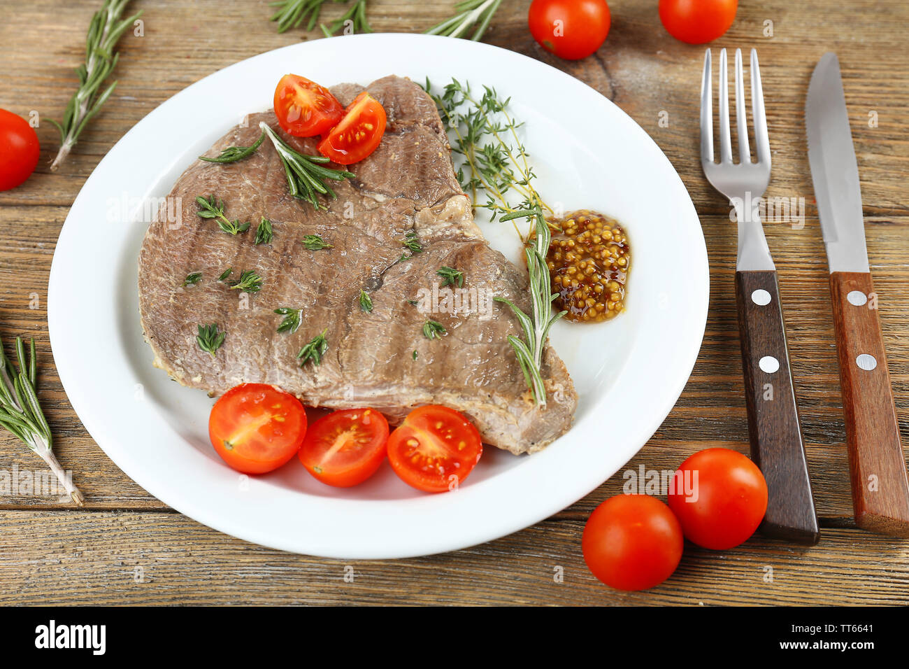 Delicious grilled meat on table Stock Photo Alamy