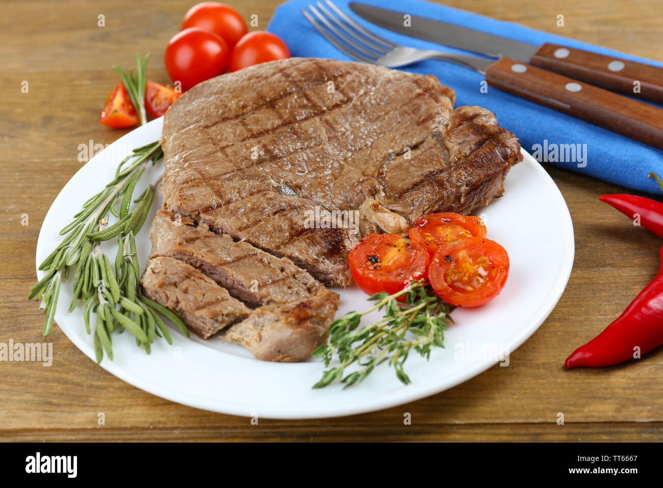 Delicious grilled meat on table Stock Photo Alamy