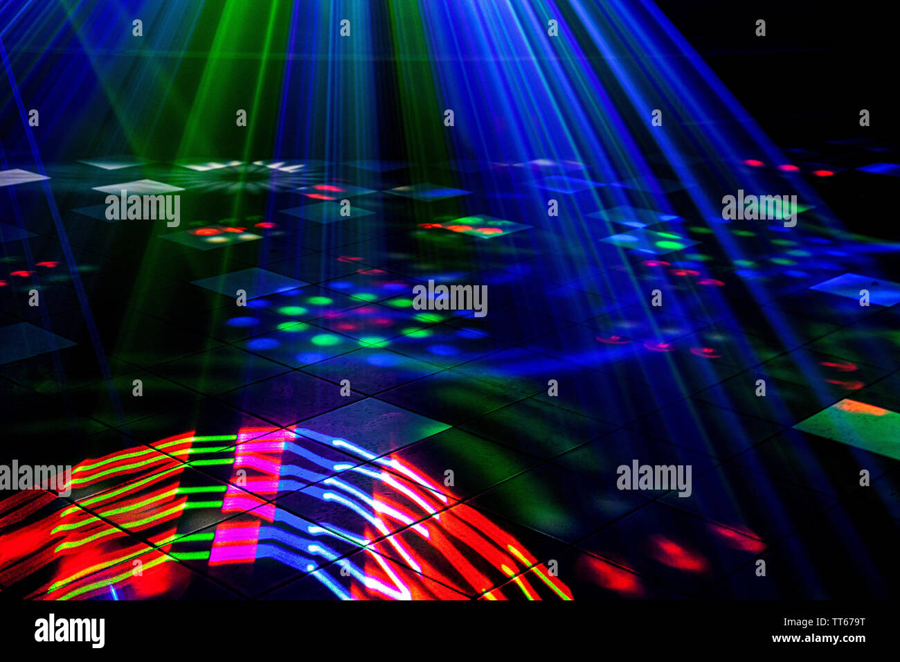 Bright nightclub red, green, purple, white, pink, blue laser lights ...