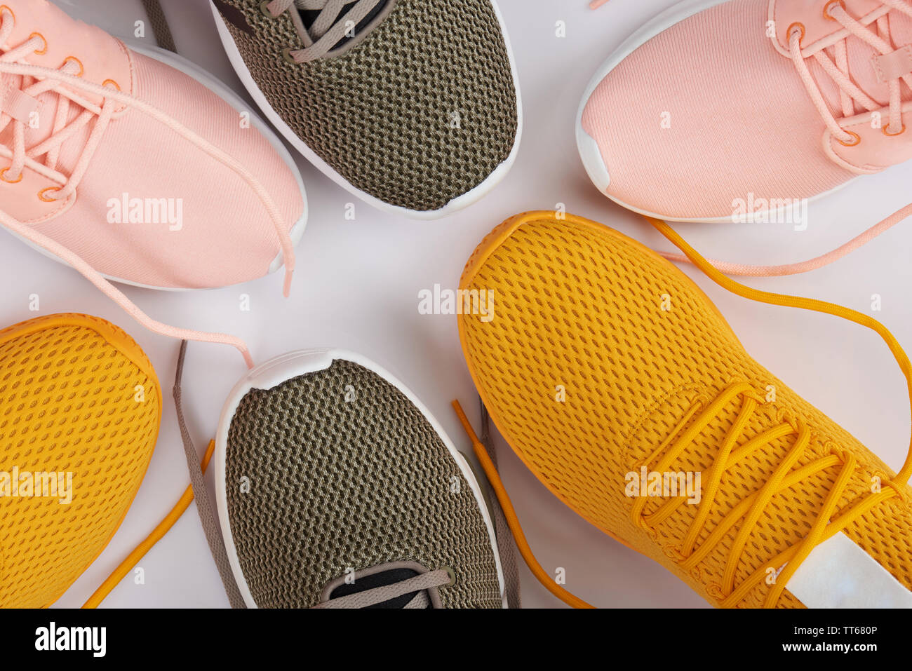 Close-up of different sport running shoes above top view Stock Photo