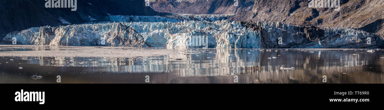 Panorama/ Pano vista of Johns Hopkins Glacier, a 12 mile long glacier in Glacier Bay National Park and Preserve, Alaska. Captured October 2017. Stock Photo