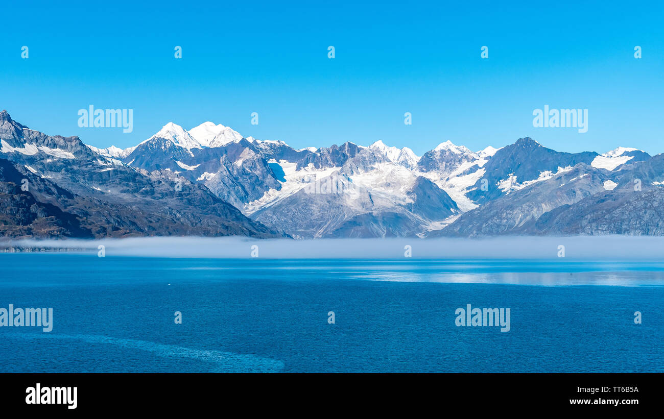 Glacier Bay National Park, Alaska. Spectacular breathtaking sweeping vista of ice capped/ snow covered mountains, glaciers, wildlife landscape. Stock Photo