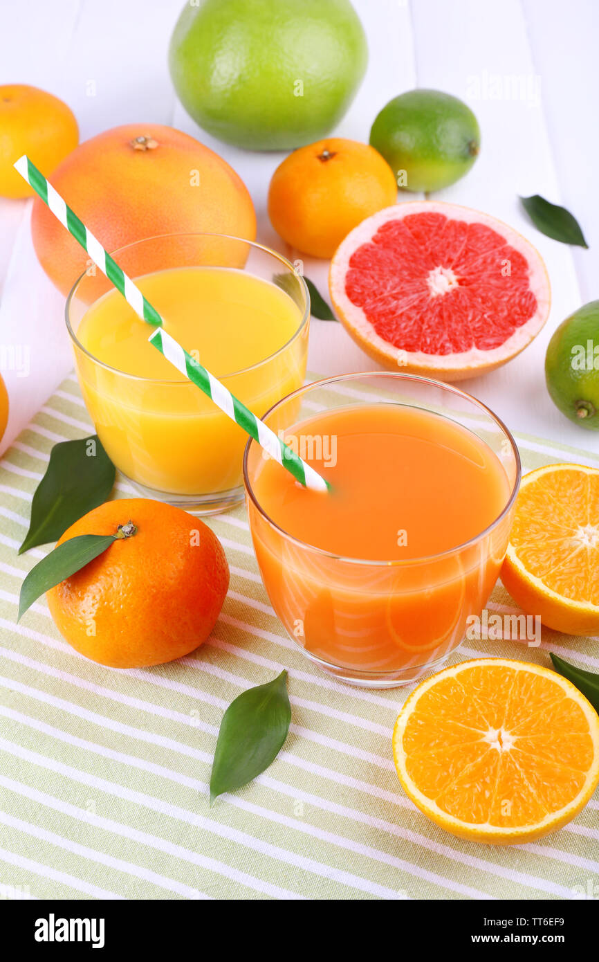 Juices and many citrus closeup Stock Photo Alamy