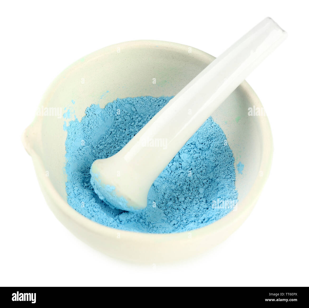 Laboratory pestle in mortar with ground material, isolated on white