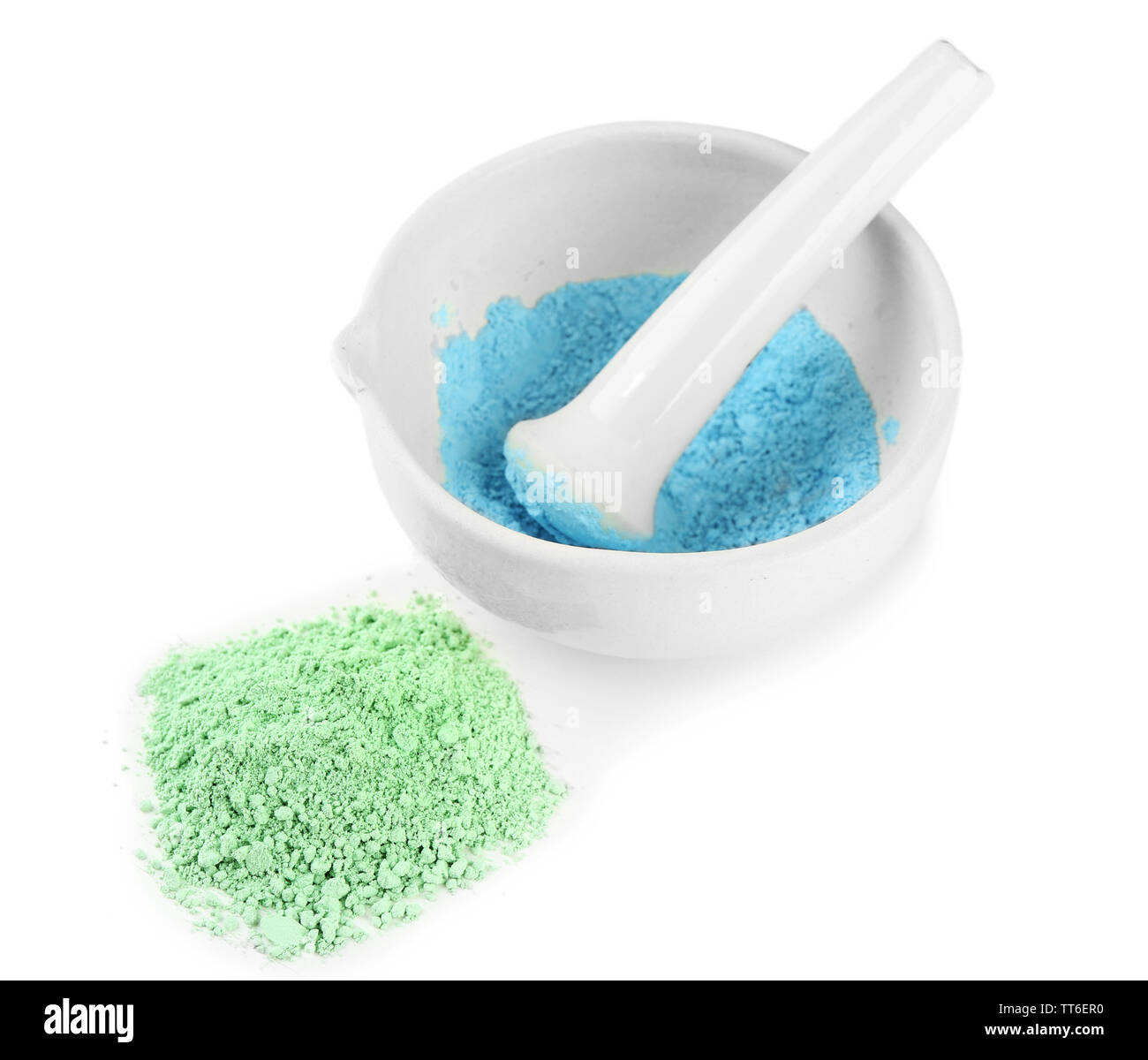 Laboratory pestle in mortar with ground material, isolated on white