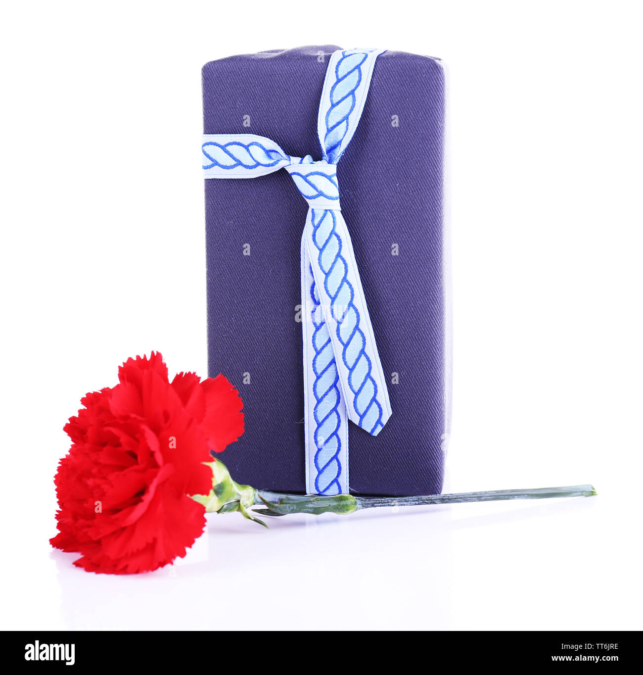 Gift box with red carnation isolated on white background Stock Photo