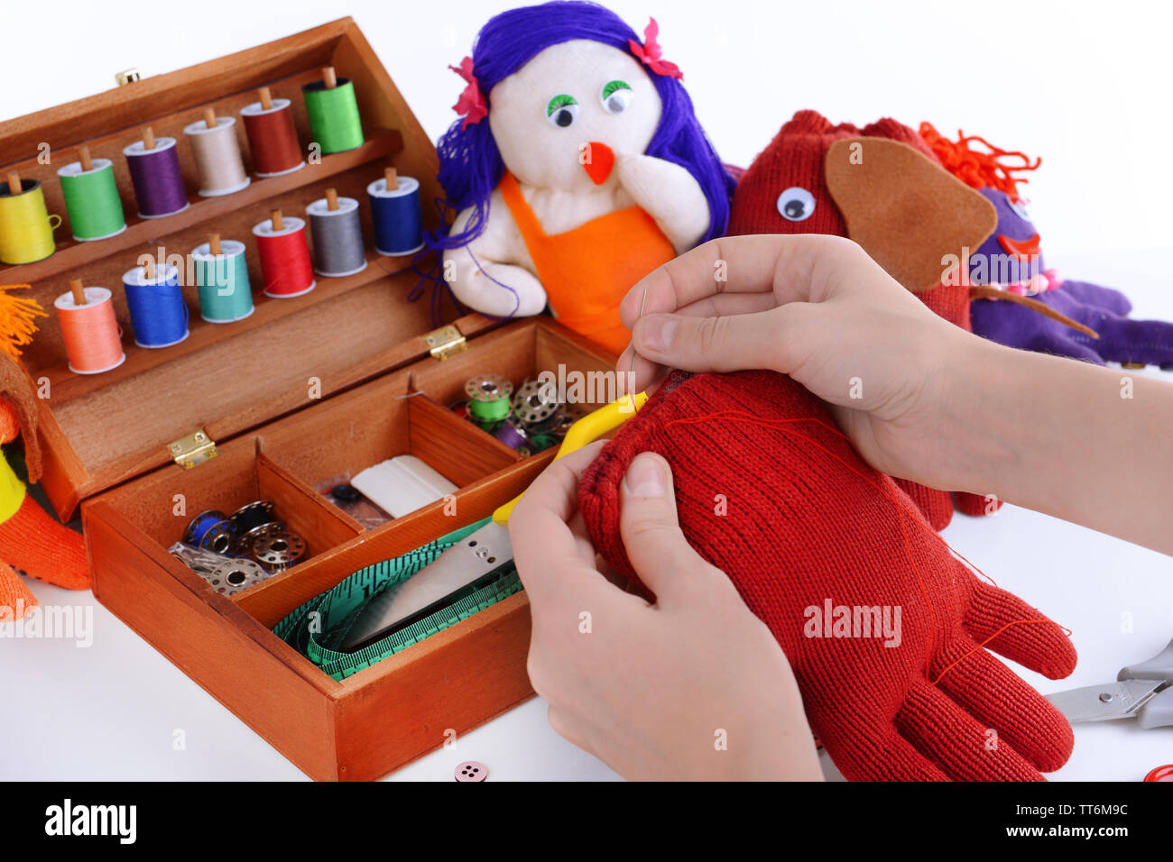 Making of handmade toys from gloves on white background Stock Photo - Alamy