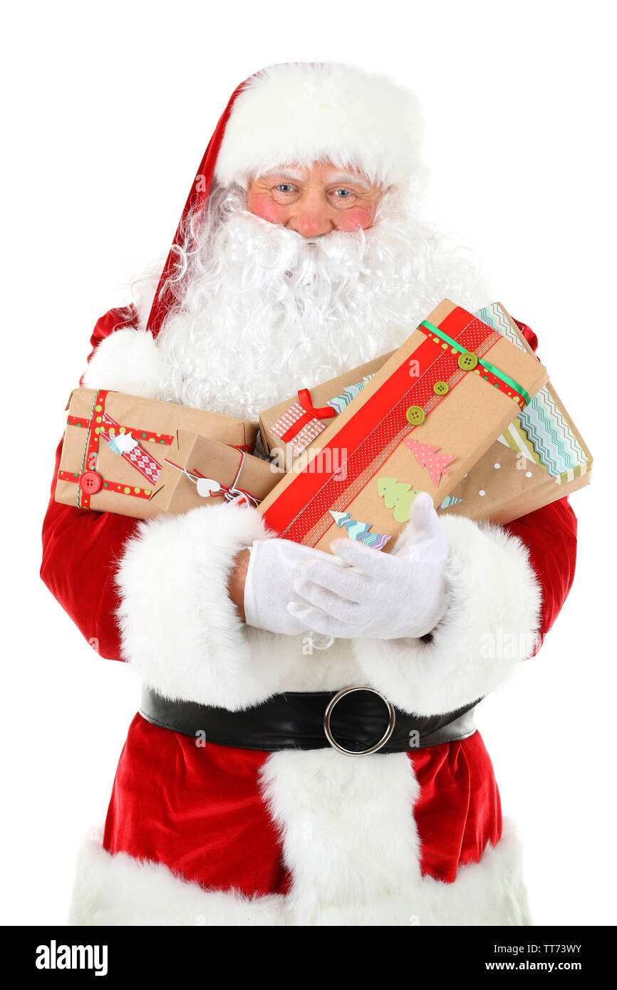 Santa Claus holding gift boxes isolated on white background Stock Photo ...