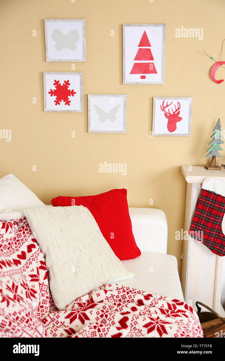 White sofa in decorated living room. Christmas decoration concept Stock