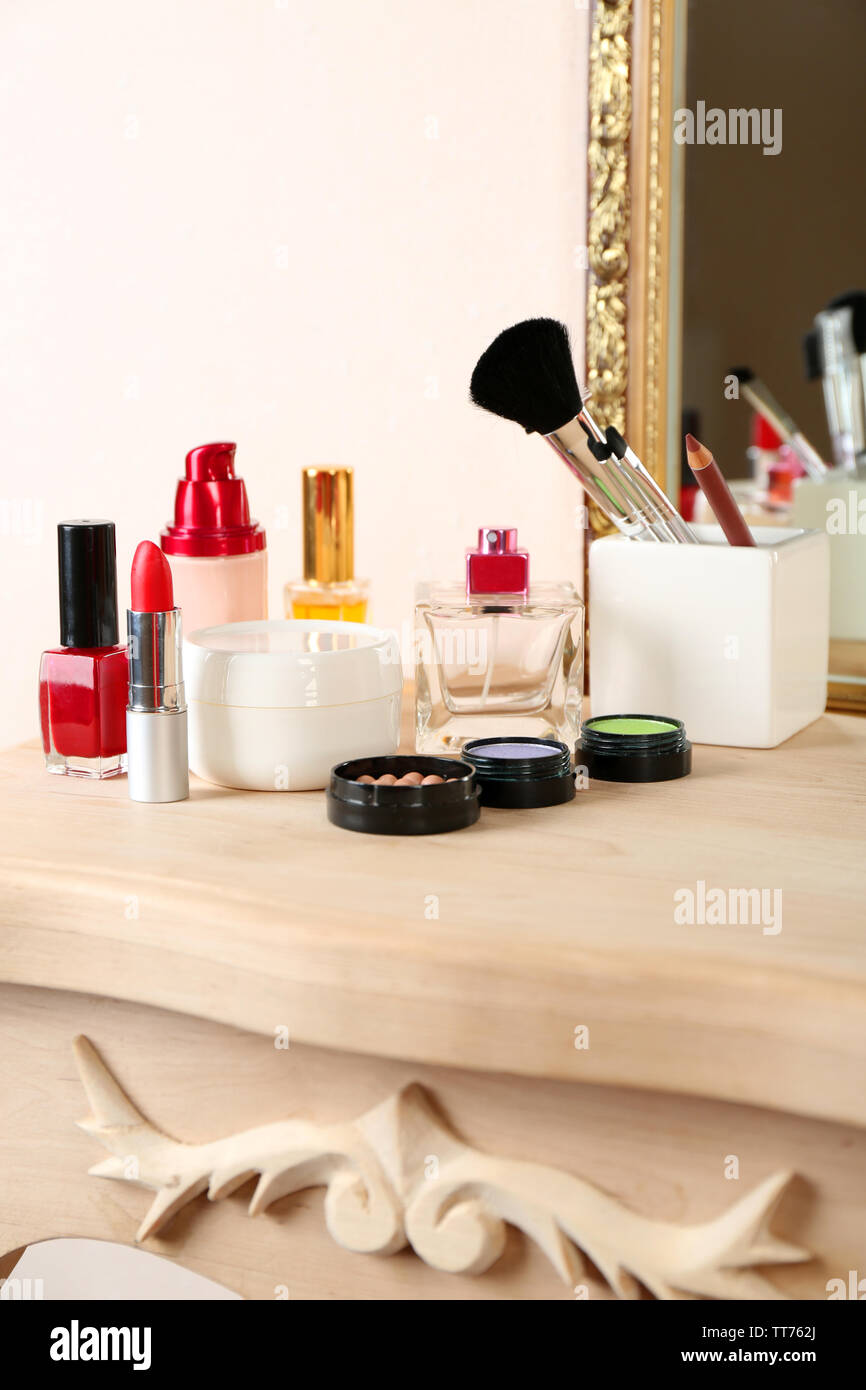 Different cosmetics on dressing table, close up Stock Photo - Alamy