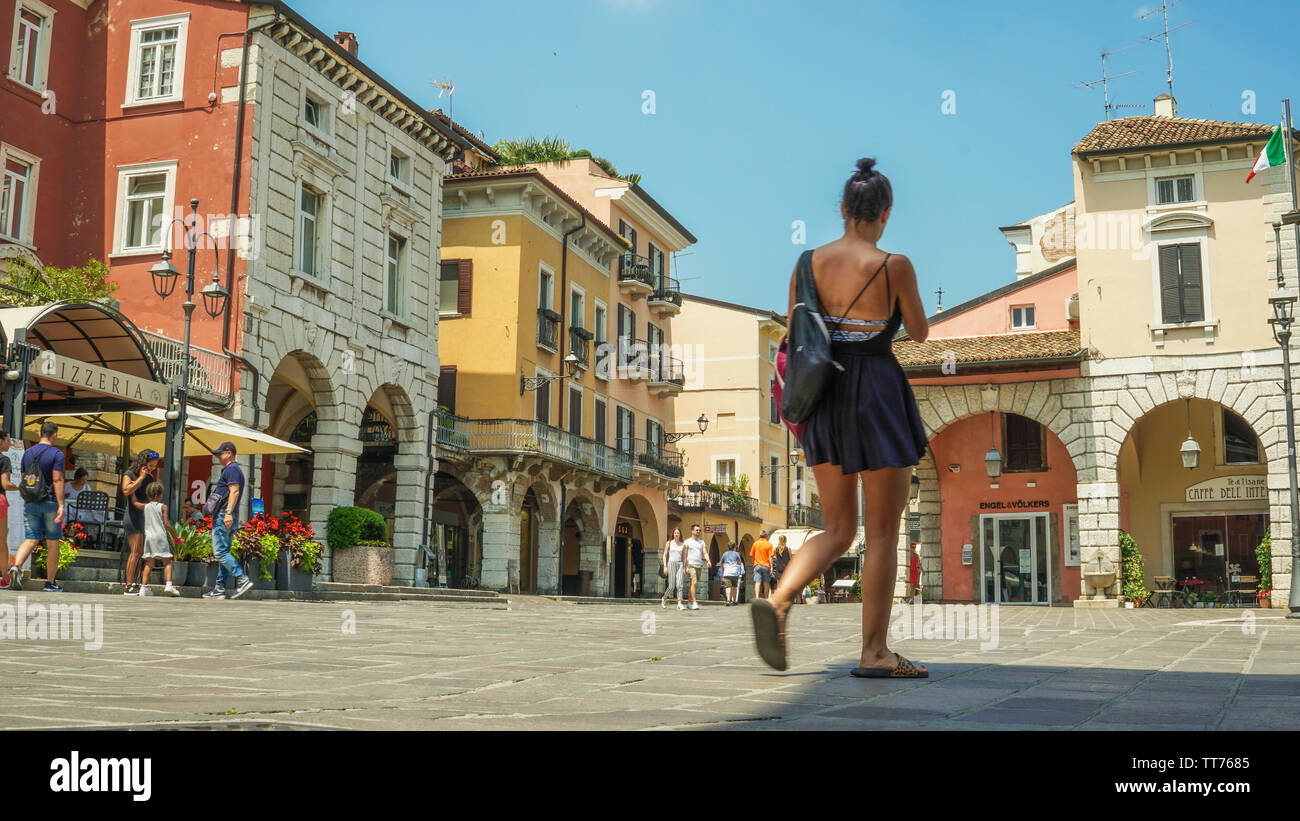 Piazza malvezzi Desenzano del Garda Italy daytime with people walking trough Stock Photo