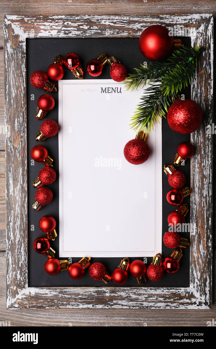Menu board with Christmas decoration on wooden planks background Stock