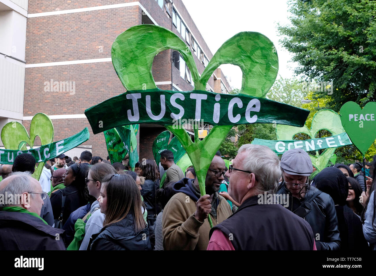 Hundreds of people gather in North Kensington to mark the second anniversary of the fire at Grenfell tower. Stock Photo