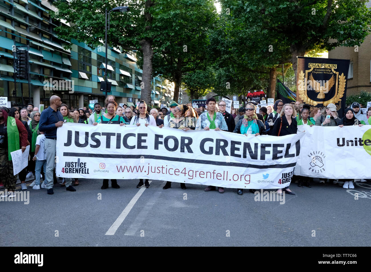 Hundreds of people joined the silent march to remember the victims of Grenfell tragedy. Stock Photo