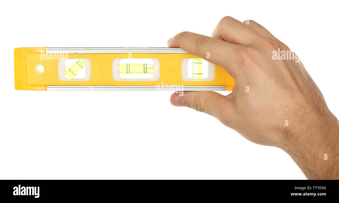 Male hand with ruler level isolated on white Stock Photo - Alamy