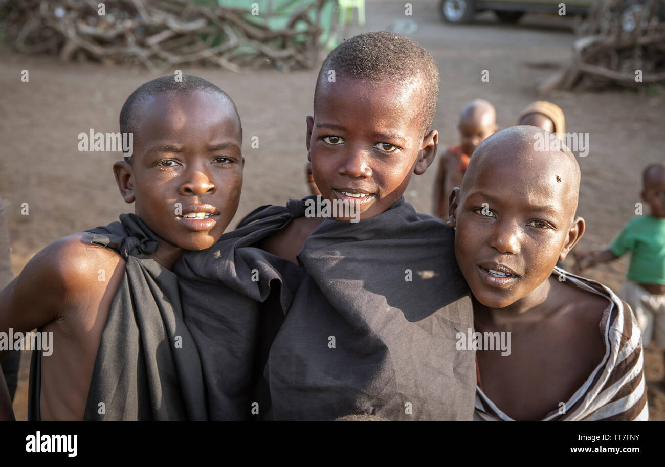 Same, Tanzania, 4th June, 2019:   Maasai  boys dressed in black ready for their 'right of passage' ceremony that takes them to the next stage in their Stock Photo