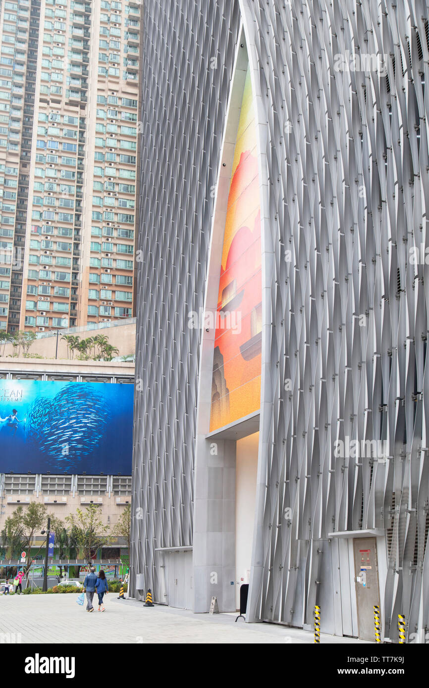 People walking outside Xiqu Centre, West Kowloon, Hong Kong, China Stock Photo