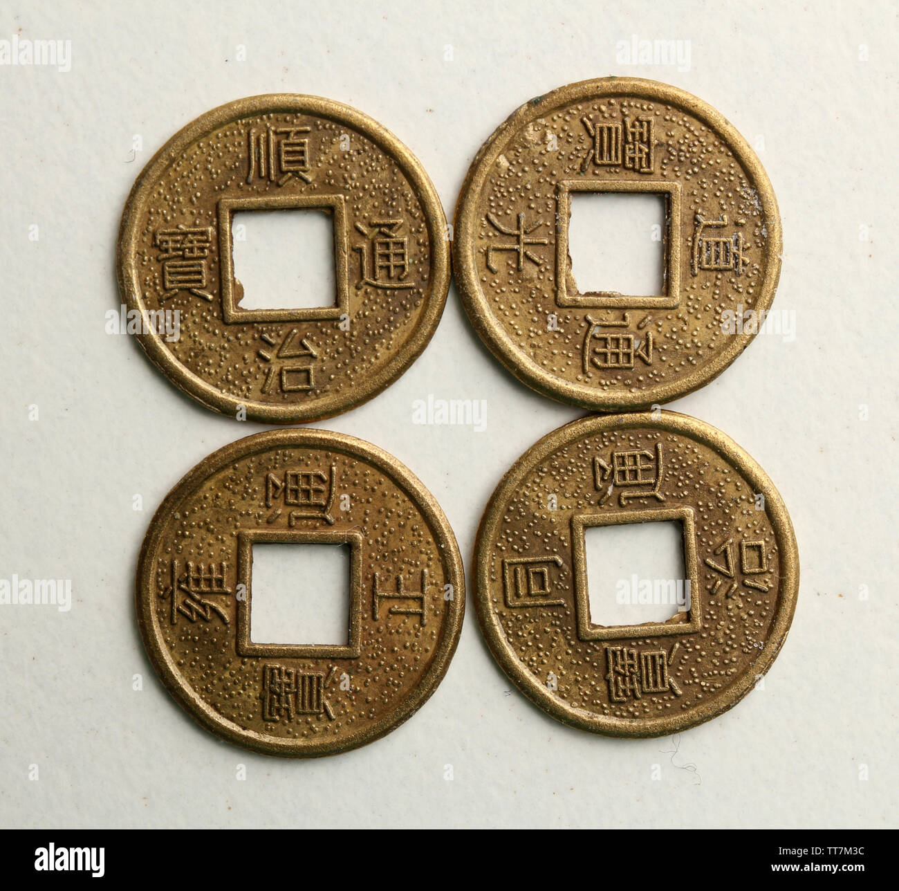 Chinese coins red ribbon hi-res stock photography and images - Alamy