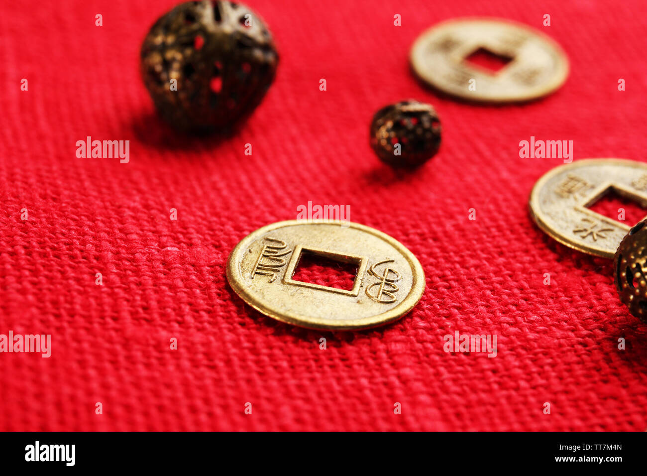 Chinese coins red ribbon hi-res stock photography and images - Alamy
