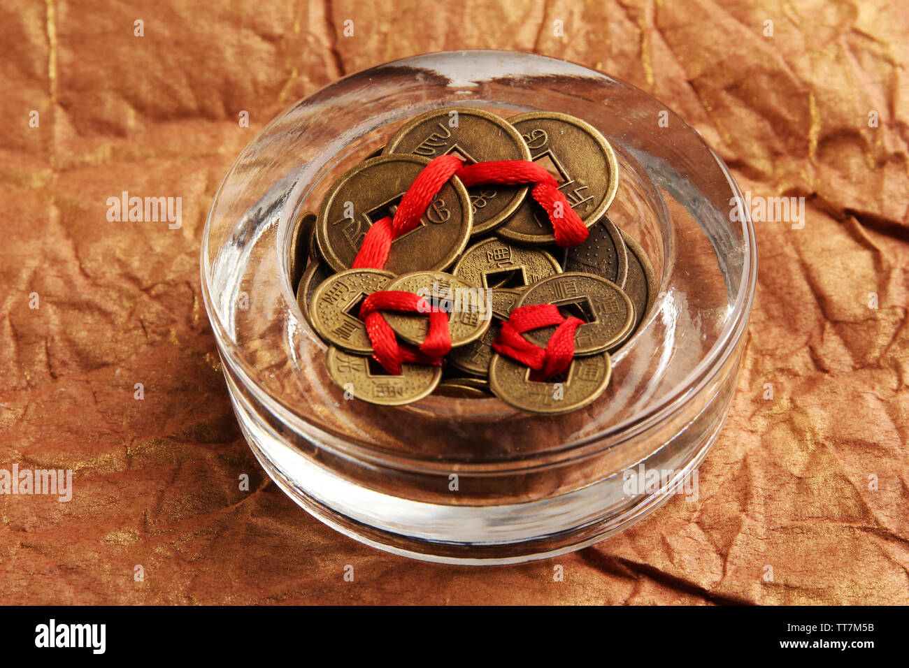 Chinese coins red ribbon hi-res stock photography and images - Alamy