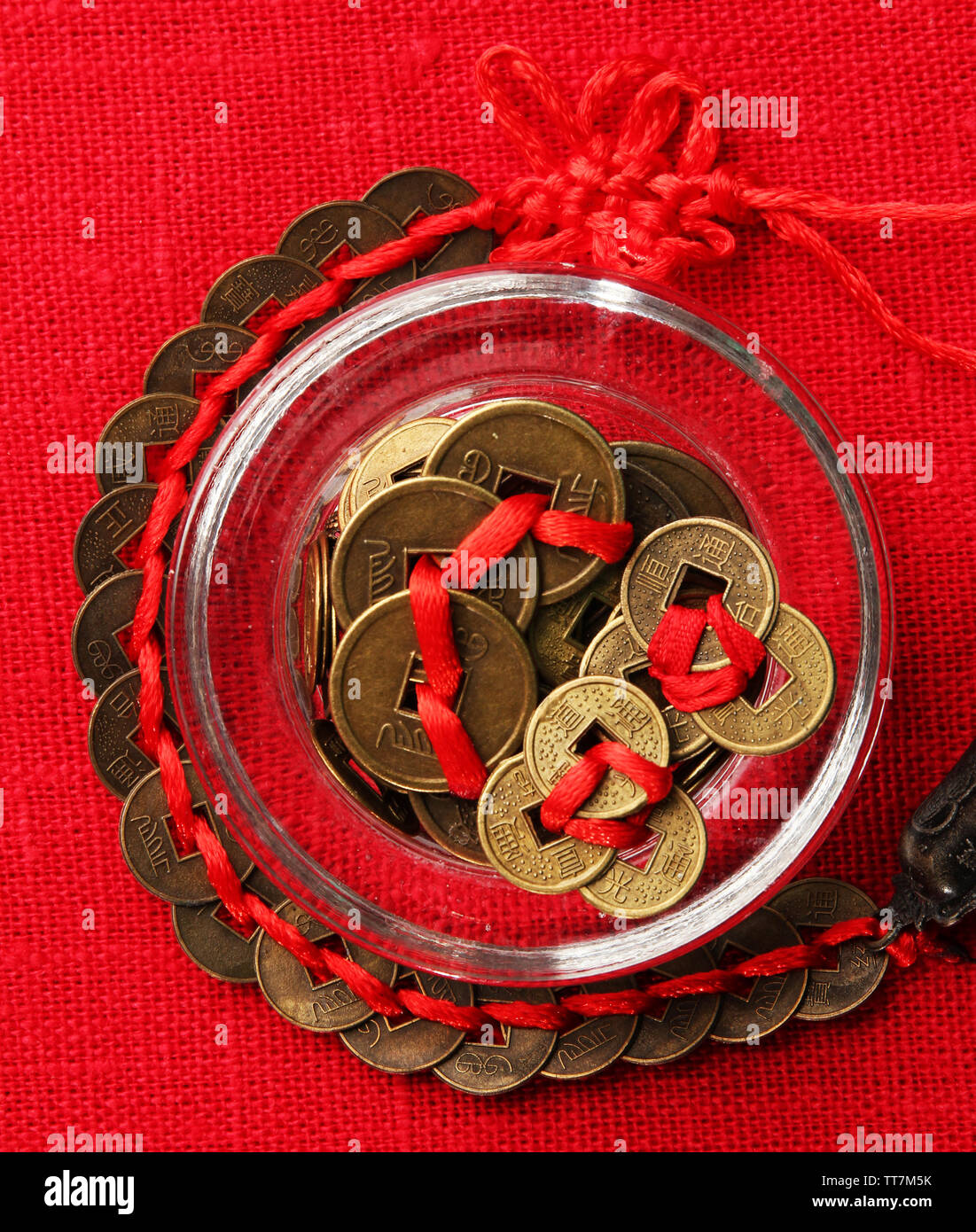 Chinese coins red ribbon hi-res stock photography and images - Alamy