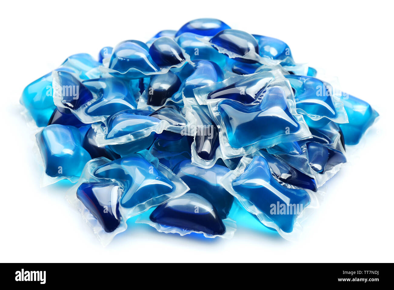 Gel capsules with laundry detergent isolated on white Stock Photo Alamy