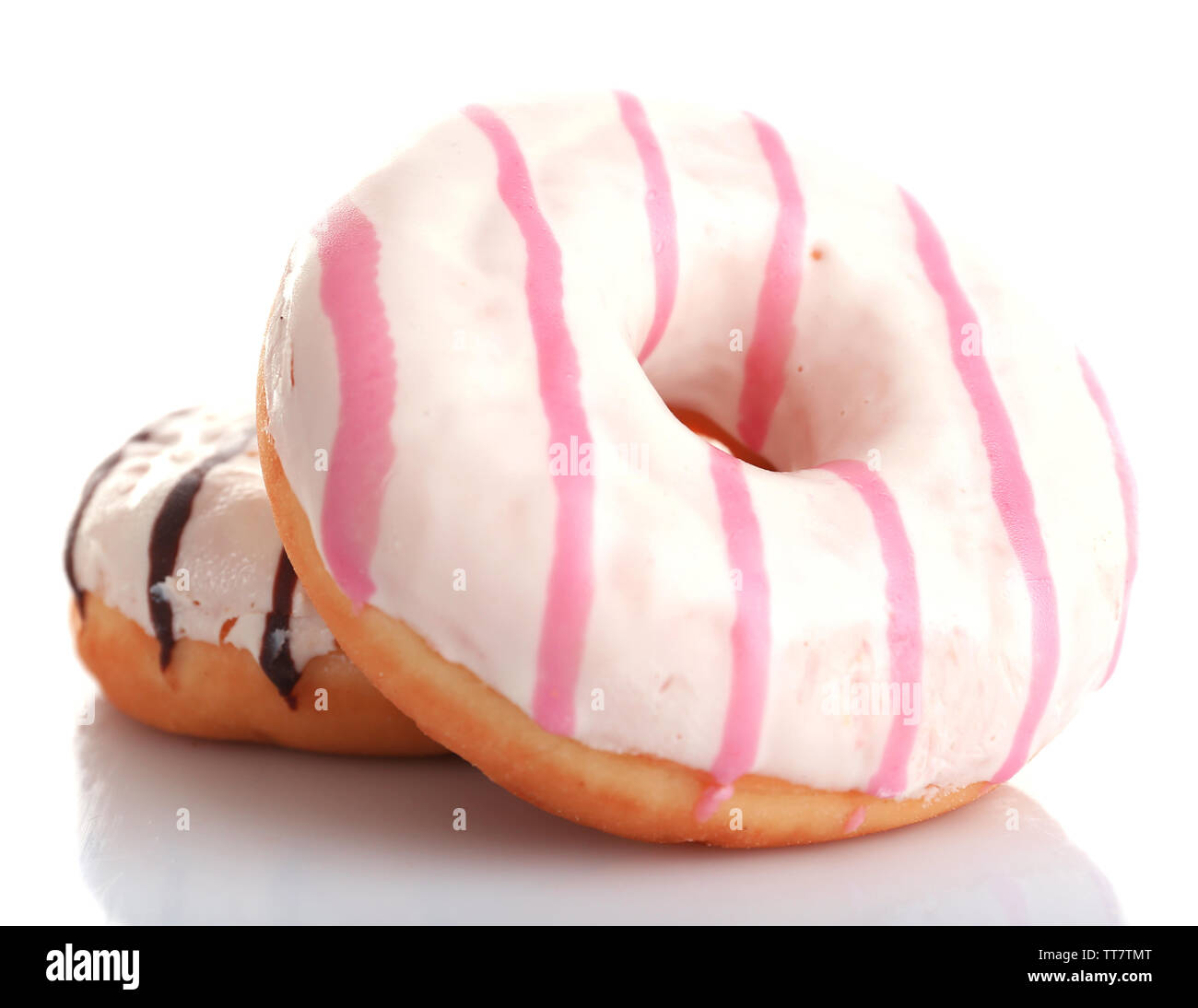 Delicious donuts with icing isolated on white Stock Photo - Alamy