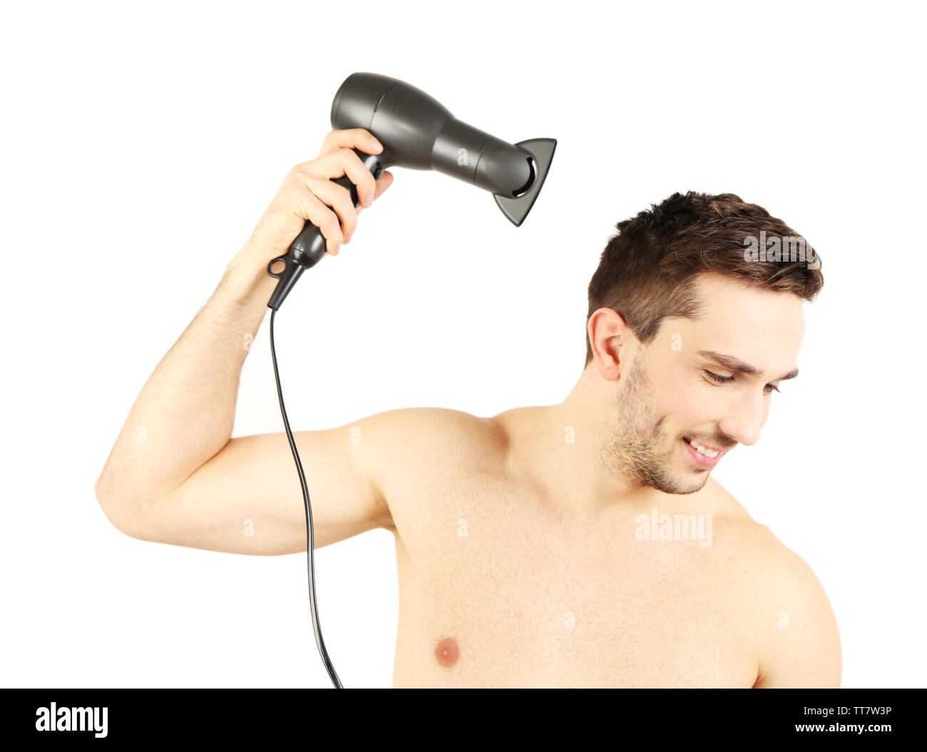 Handsome young man blow drying his hair isolated on white Stock Photo - Alamy Handsome young man blow drying his hair isolated on white Stock Photo - Alamy
